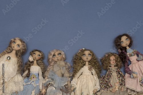 Dolls on a blue background