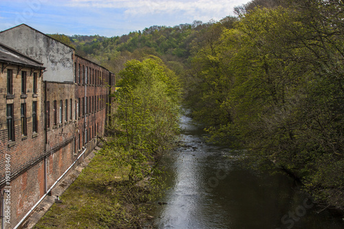 Old factory on the river bank