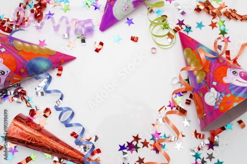 Greeting card for carnival party. hat and candles on white background.