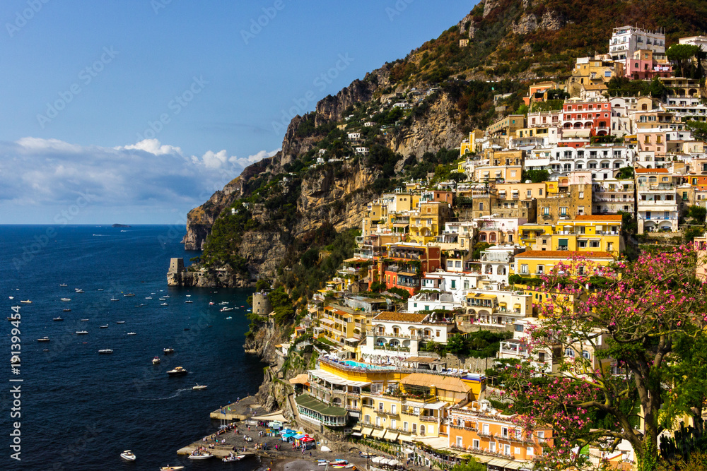 beach streets and colorful houses on the hill in Positano on Amalfi Coast in Italy 