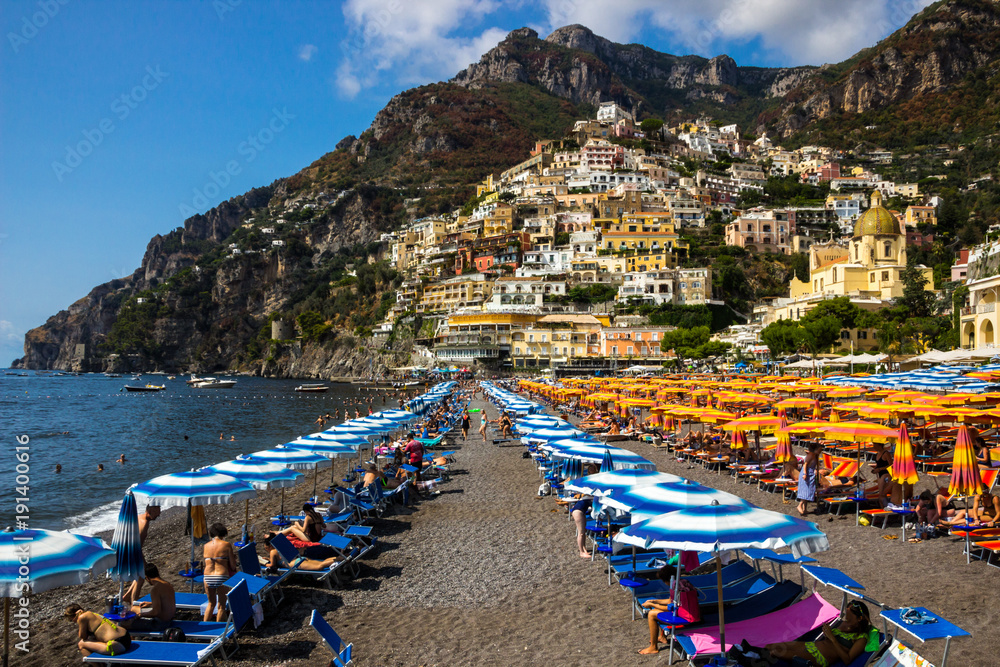 beach streets and colorful houses on the hill in Positano on Amalfi Coast in Italy 