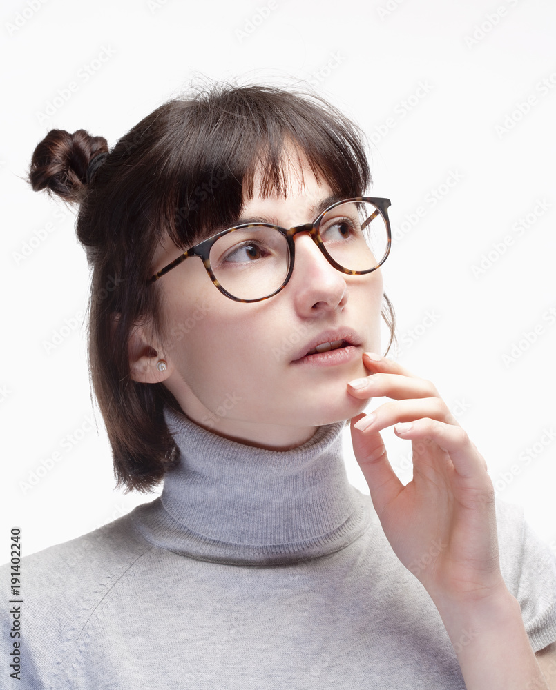 Teenage Girl with Dark Hair and Glasses.