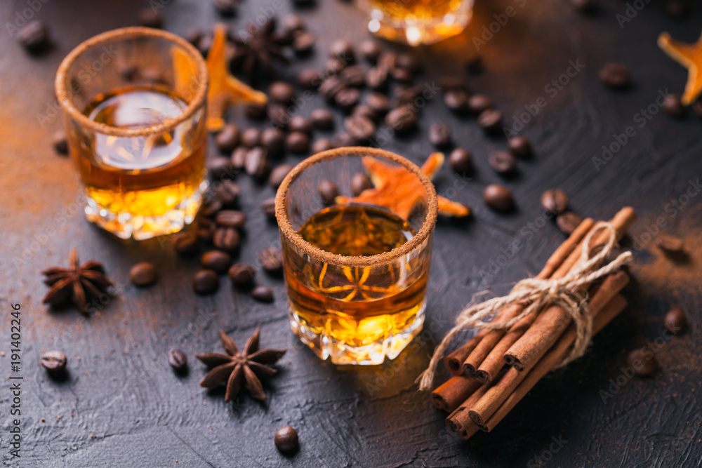 Whiskey, brandy or liquor, spices, anise stars, coffee beans, cinnamon sticks