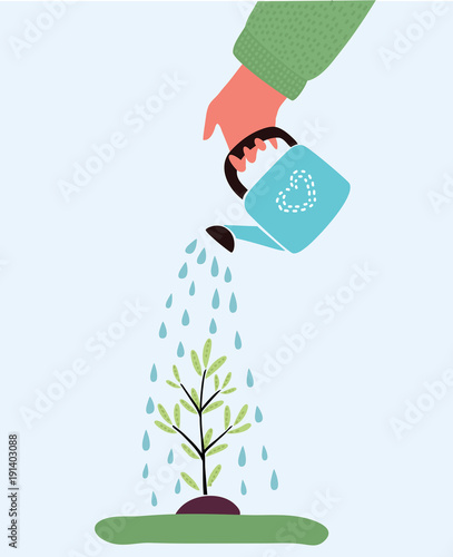 Watering plant with watering can. 