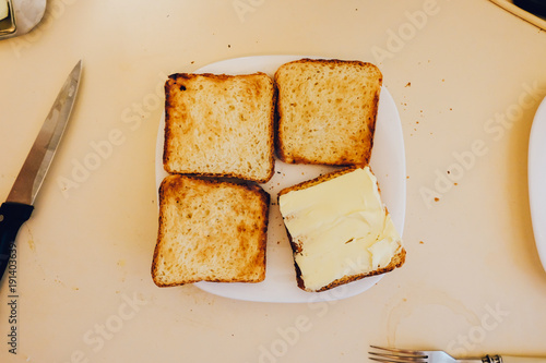Four toasts on the white plate