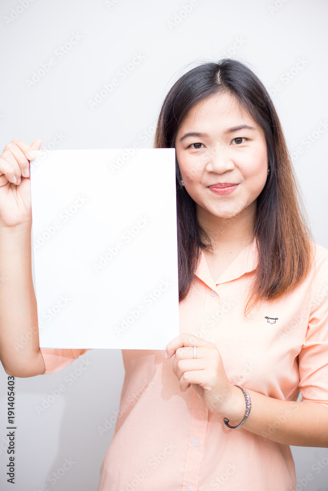 Business women holding blank white paper for put message Business women holding blank white paper for put message