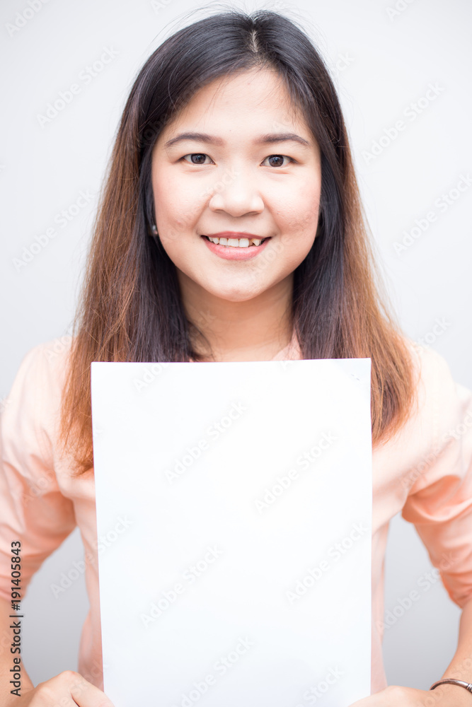 Business women holding blank white paper for put message Business women holding blank white paper for put message