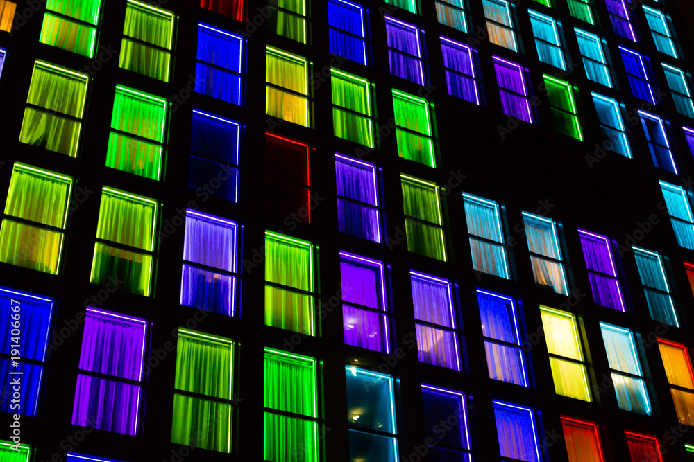 Colored windows texture. Neon light background Colored windows texture. Neon light background