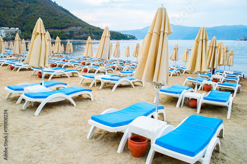 Sun loungers on a beach in Turkey © dima