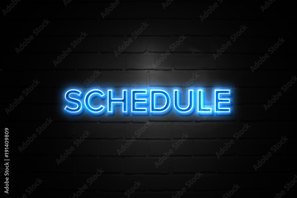 Schedule neon Sign on brickwall