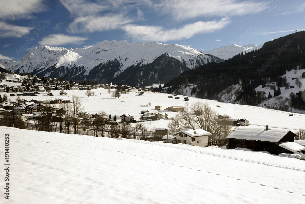 A panorama view of beautiful swiss village in the alps switzerland in winter