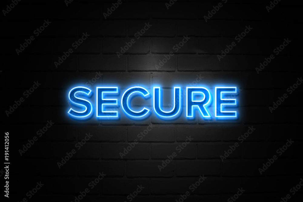 Secure neon Sign on brickwall