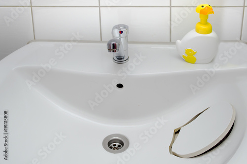 White ceramic shell with a large pothole