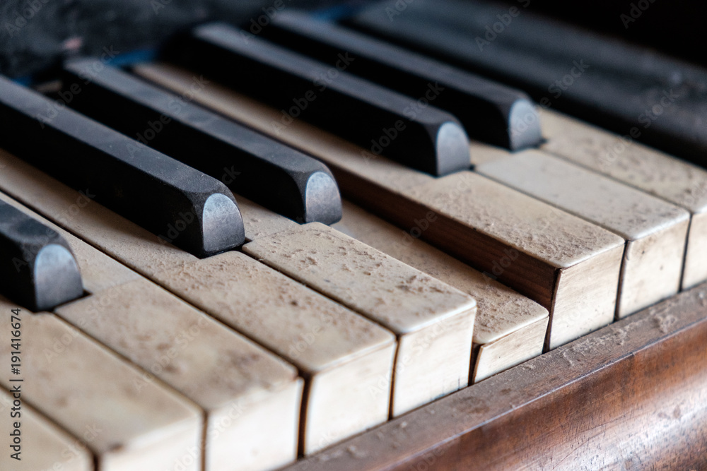 last song remains - old dirty piano keys need cleaning, close up Stock  Photo | Adobe Stock