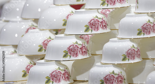 Many porcelain bowls together