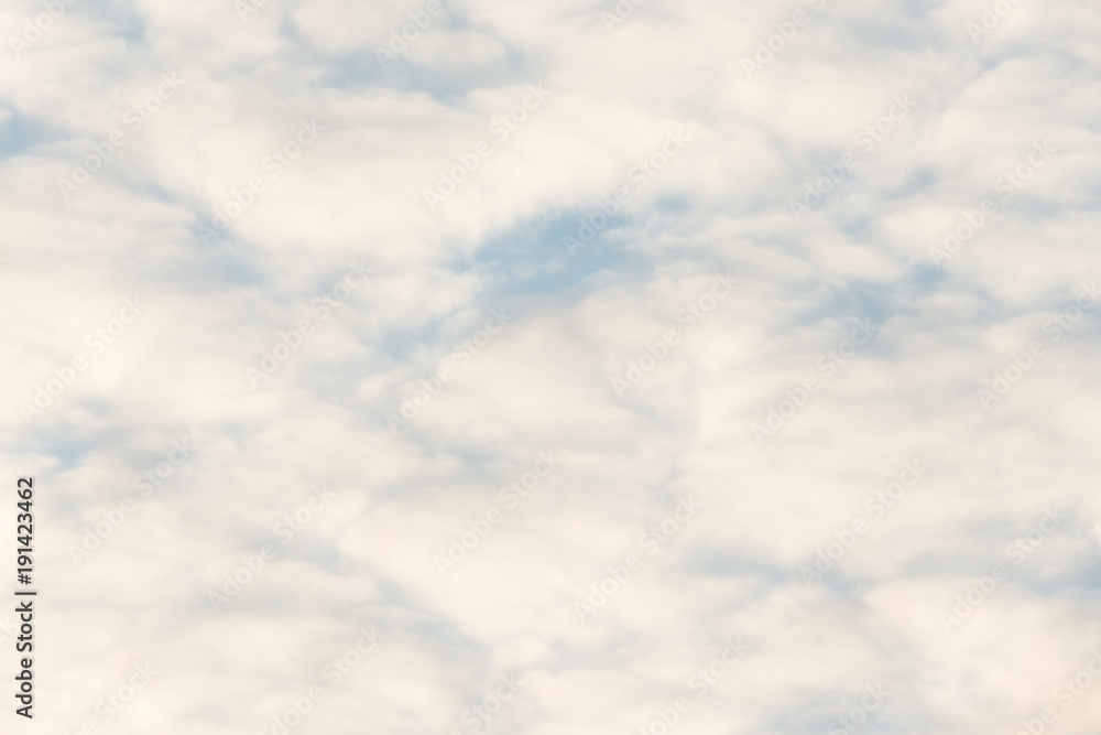 Calm sunset clouds and blue sky background Calm sunset clouds and blue sky background
