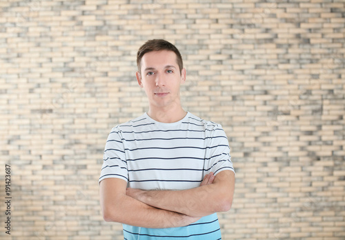 Portrait of young man in ca...