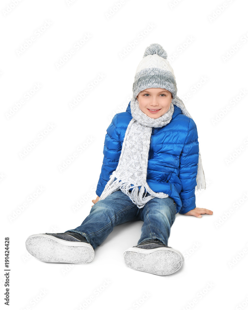 Cute little boy in warm clothing on white background. Ready for winter vacation Cute little boy in warm clothing on white background. Ready for winter vacation