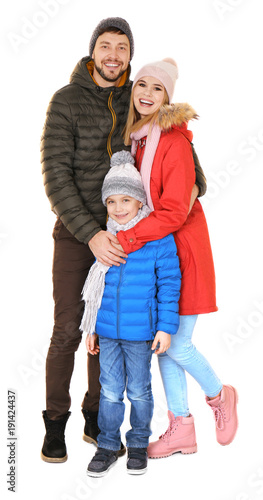 Happy family in warm clothi...
