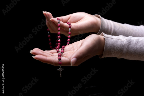 Woman praying indoors