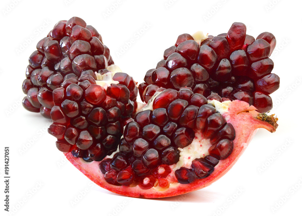 Red pomegranate fruits isolated on white background Red pomegranate fruits isolated on white background