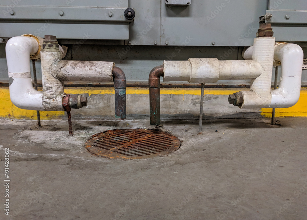 dual condensate traps to drain on an air handling unit Stock Photo Adobe Stock