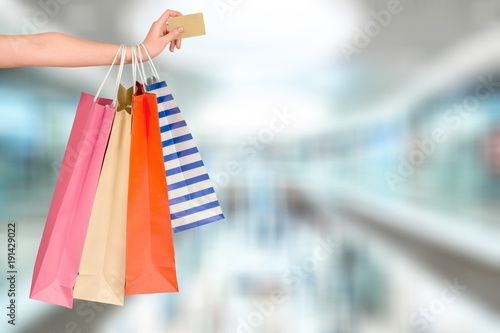 Woman hand with many shopping bag
