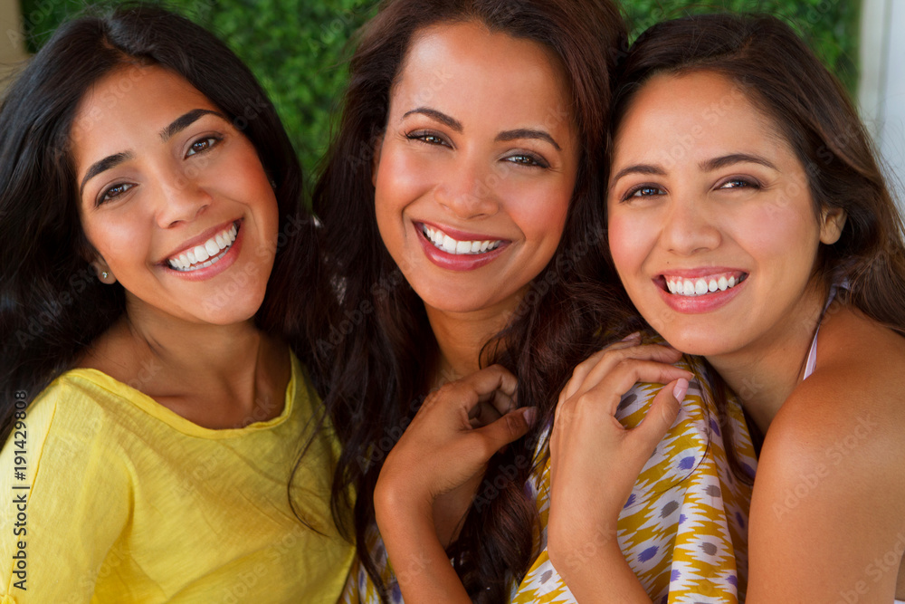 Beautiful Hispanic women smiling at the beach. Beautiful Hispanic women smiling at the beach.
