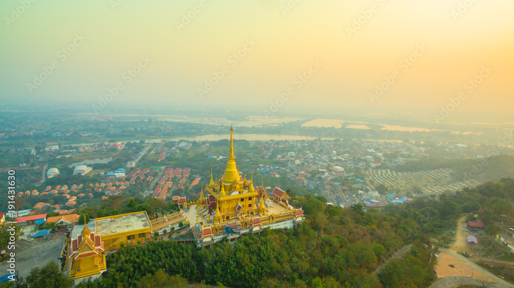 aerial view sunrise above the beautiful golden pagoda.