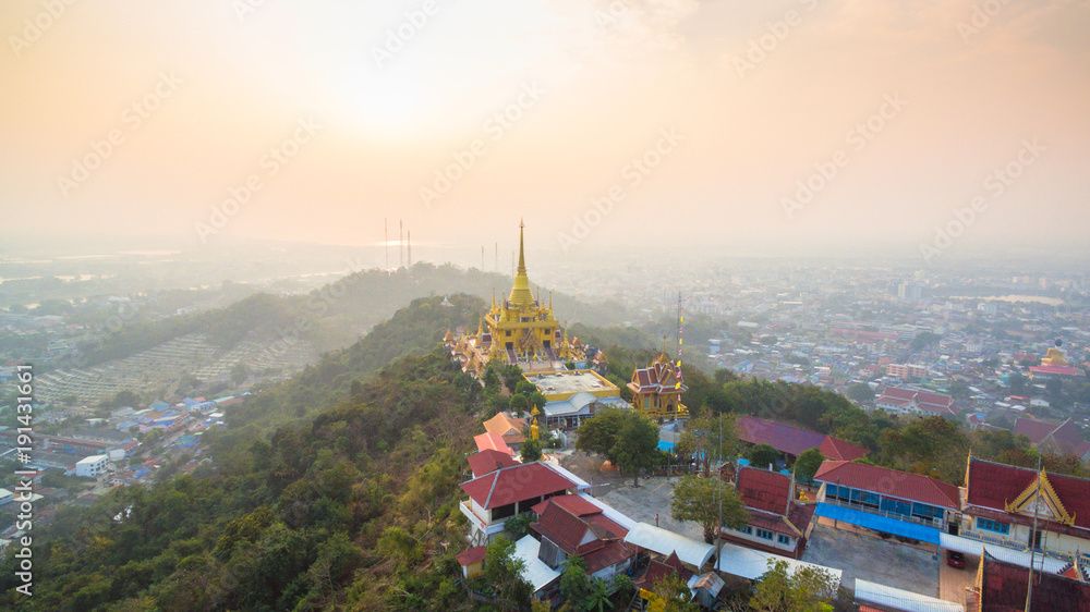 aerial view sunrise above the beautiful golden pagoda.