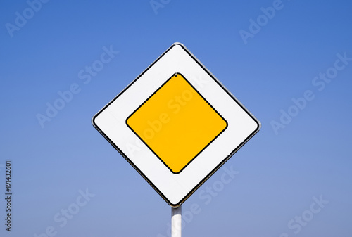 Road signs, the main road. Sign on a blue background
