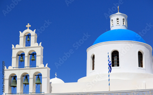 White blue orthodox church of Panagia Platsani, in the village of Oia. Santorini