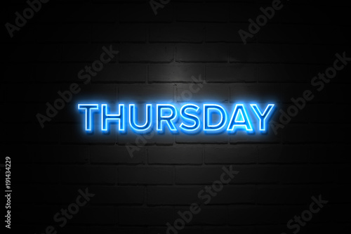 Thursday neon Sign on brickwall photo