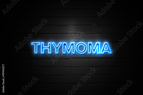 Thymoma neon Sign on brickwall photo