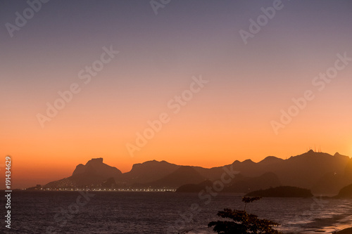 beautiful orange sunset in Itacoatiara beach, rio de janeiro