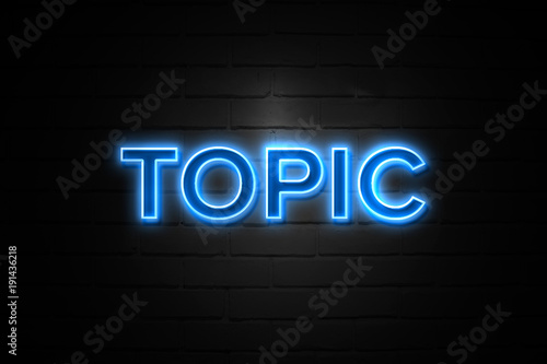 Topic neon Sign on brickwall