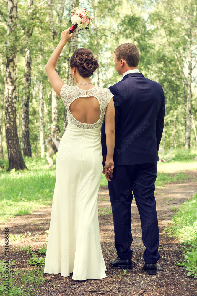 Summer romantic wedding in Provence style in the forest, on the green grass Summer romantic wedding in Provence style in the forest, on the green grass