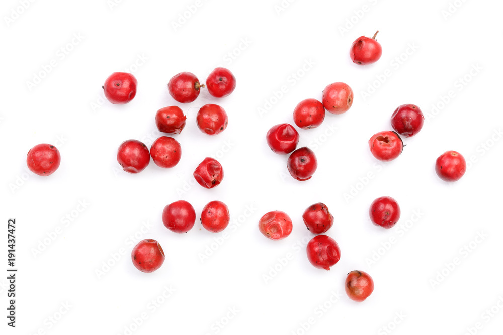 pink peppercorns seeds isolated on white background. Top view. Flat lay pink peppercorns seeds isolated on white background. Top view. Flat lay