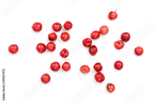 pink peppercorns seeds isolated on white background. Top view. Flat lay