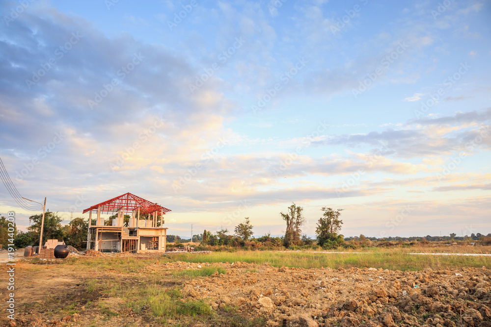 Fototapeta premium construction residential new house in progress at building site