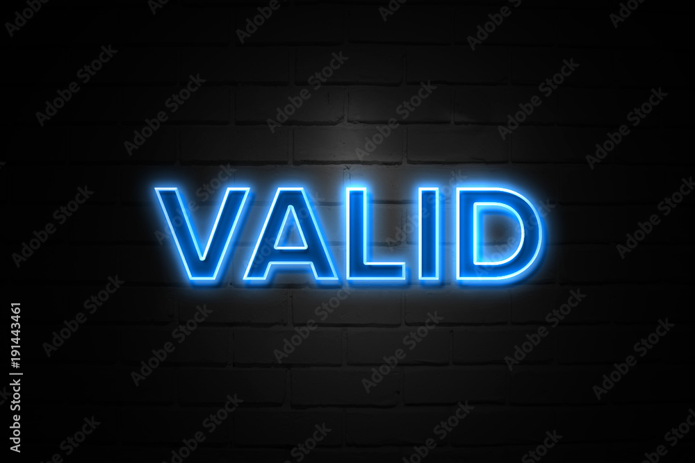 © zobaair - Valid neon Sign on brickwall