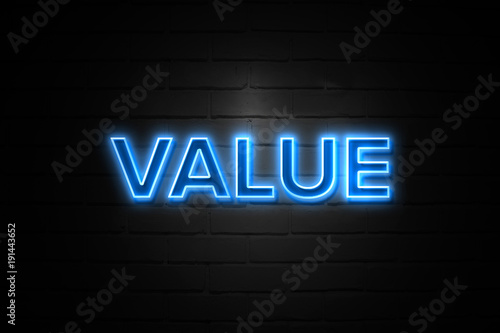 Value neon Sign on brickwall
