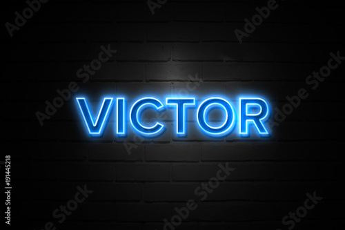 Victor neon Sign on brickwall