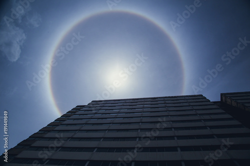 Sun Halo Natural optical phenomenon of sun light refraction from humidity in atmosphere.