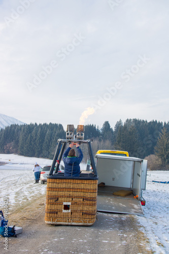 hot air balloon in winter, preparation balloon expand and fill photo