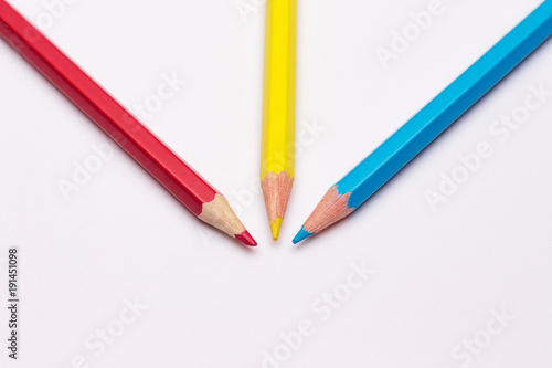 three pencils of yellow, red and blue, the primary colors