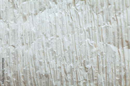 Bright crepe white paper texture background close up