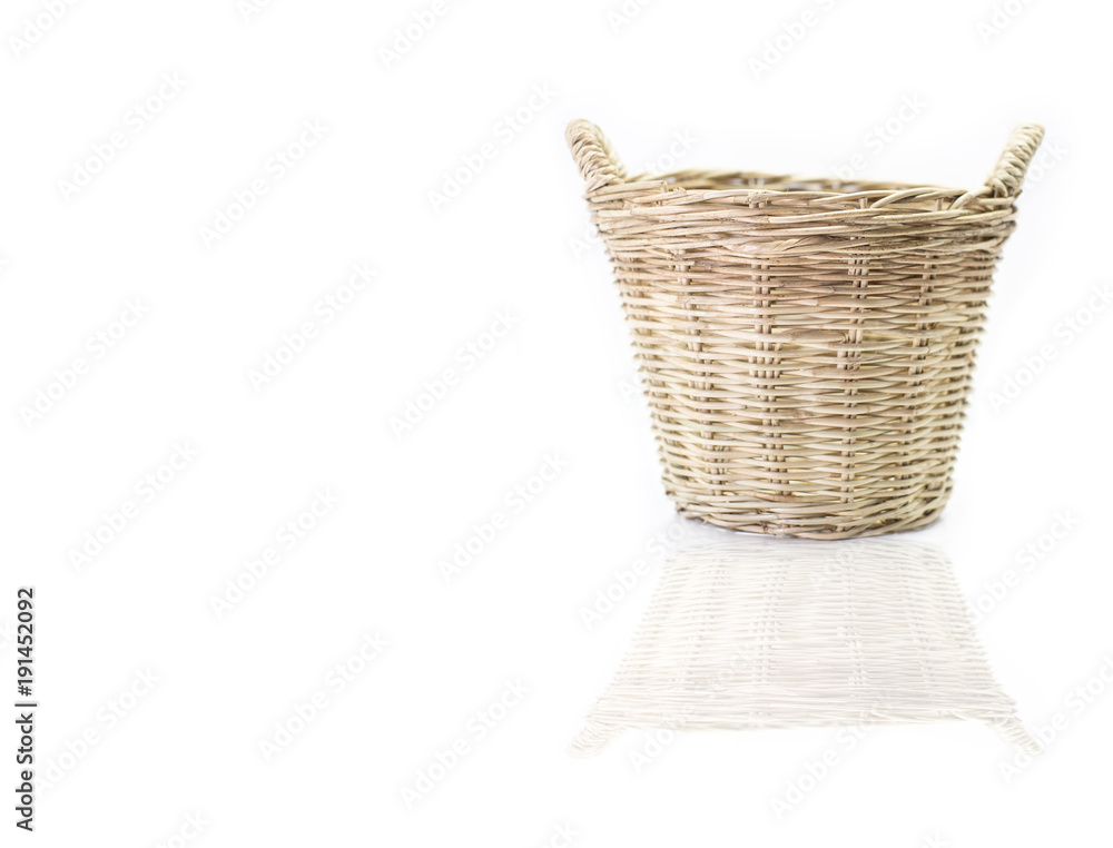 Obraz premium Wicker basket isolated on white background.