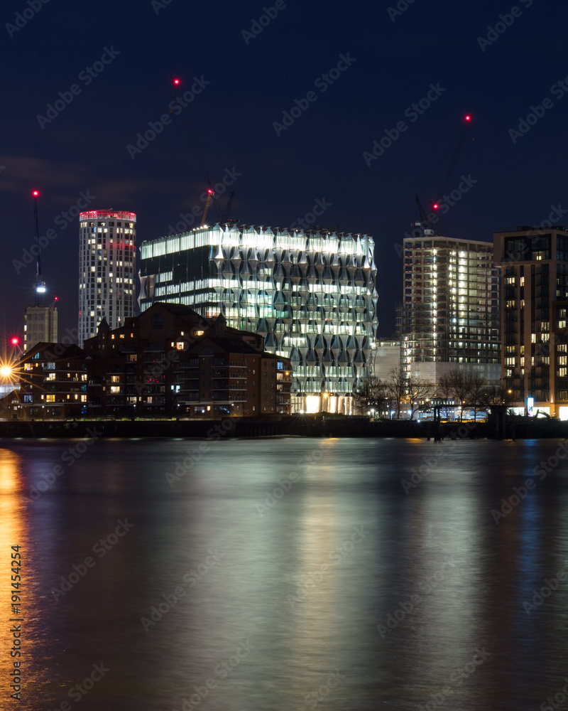 London, UK - Feb 7th, 2018: Inaugurated in Jan 2018, the new 518,000 sq foot, 12-story home of the United States Embassy in London at Nine Elms. Long-exposure at night overlooking the River Thames