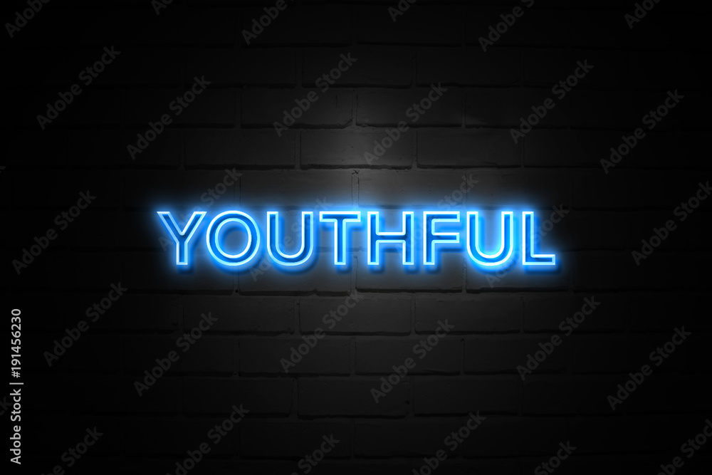 Youthful neon Sign on brickwall Youthful neon Sign on brickwall